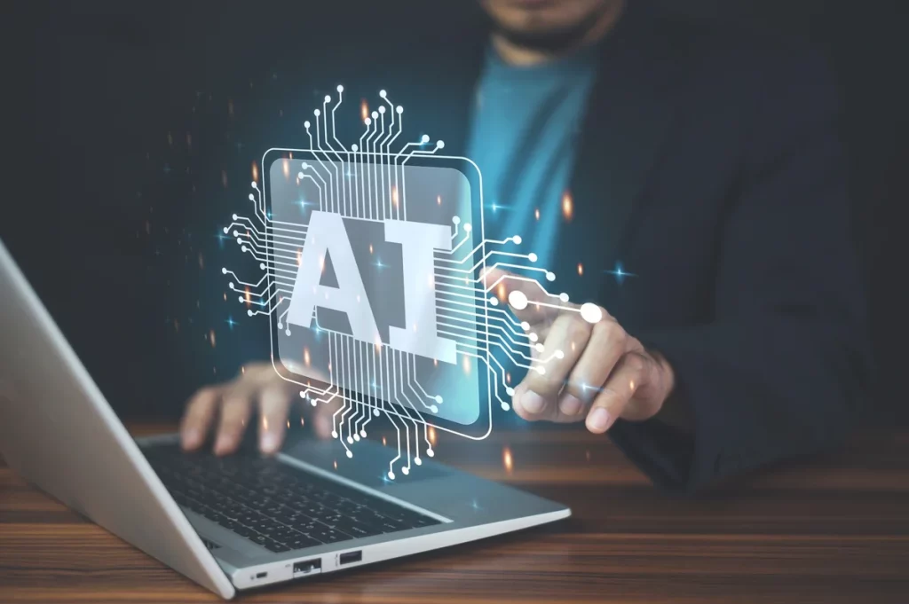 Homme interagissant avec technologie IA sur ordinateur