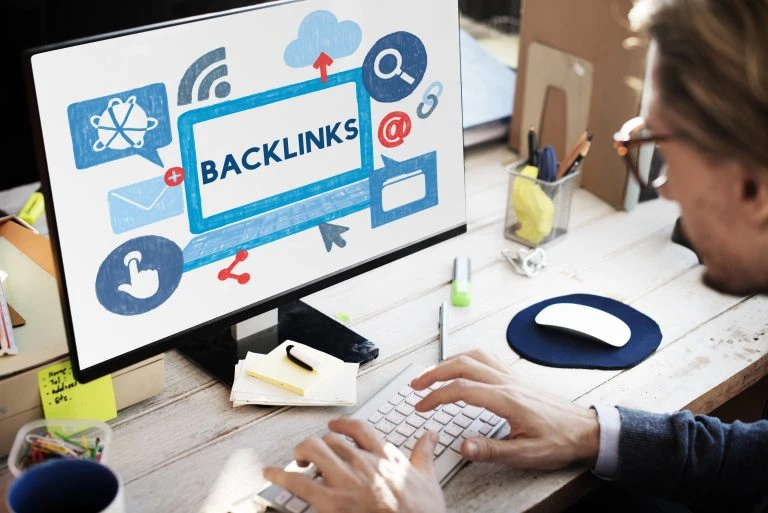Man working on SEO optimization of backlinks
