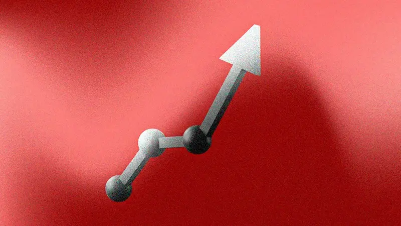 Rising gray arrow on red background