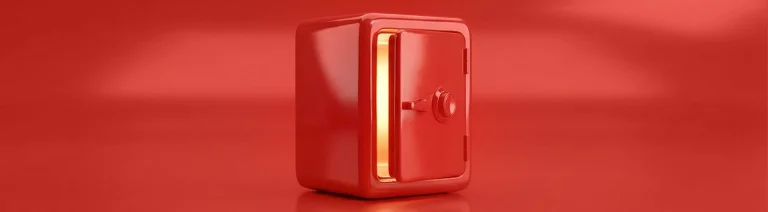 Coffre-fort rouge brillant légèrement ouvert sur un fond rouge