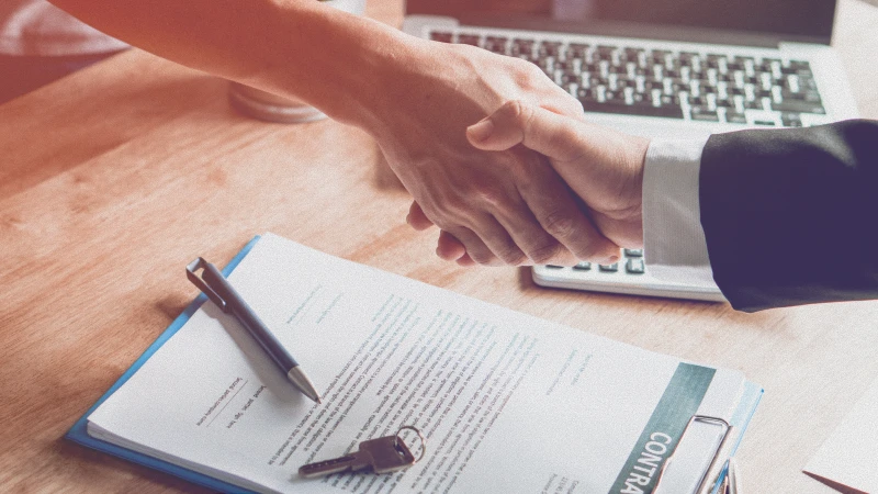 Two people holding hands.